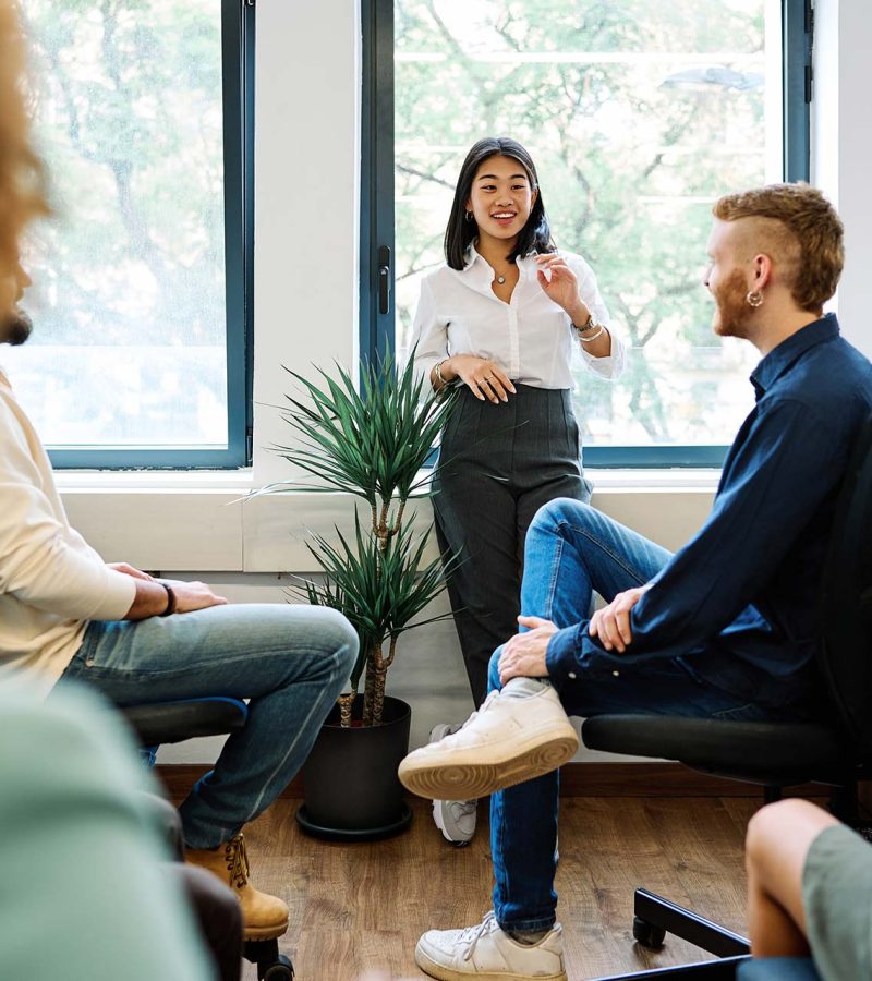 chinese-woman-talking-during-a-relaxed-meeting-on-2025-03-08-22-46-08-utc.jpg
